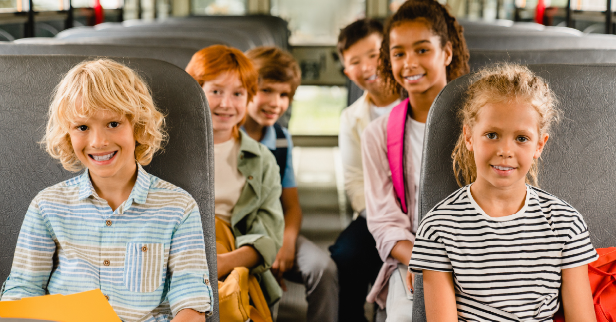 Students smiling before a field trip
